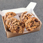 Brown butter double chocolate chip cookies from Blake's, featuring rich chocolate chips and a golden-brown exterior.